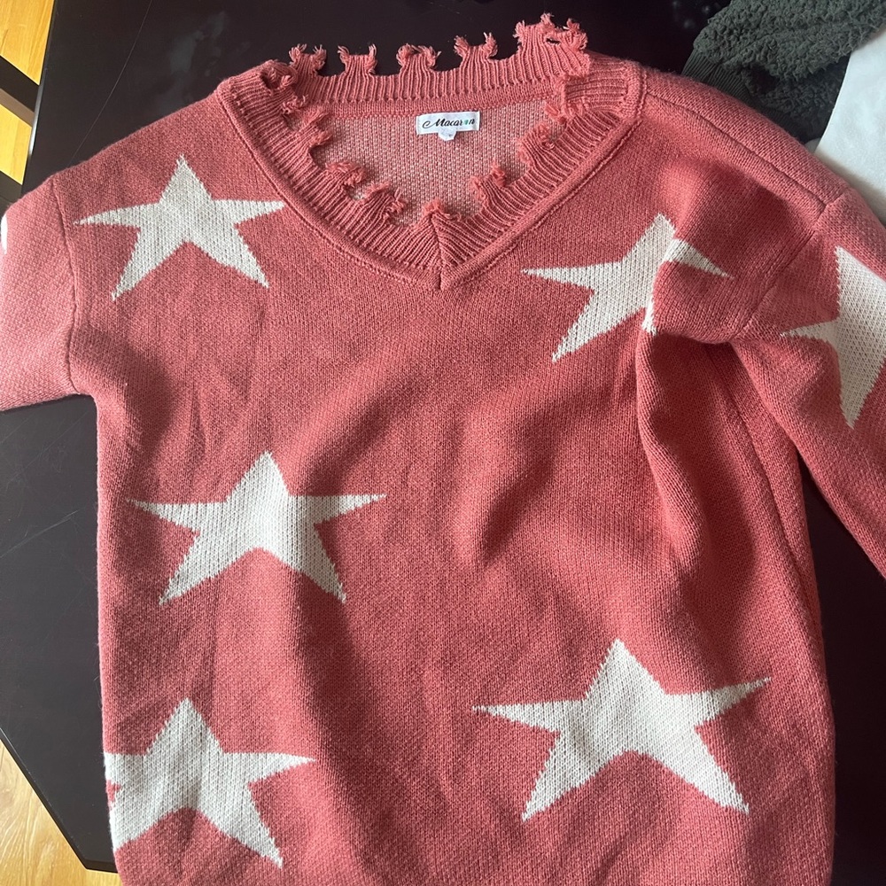 Pink sweater with stars